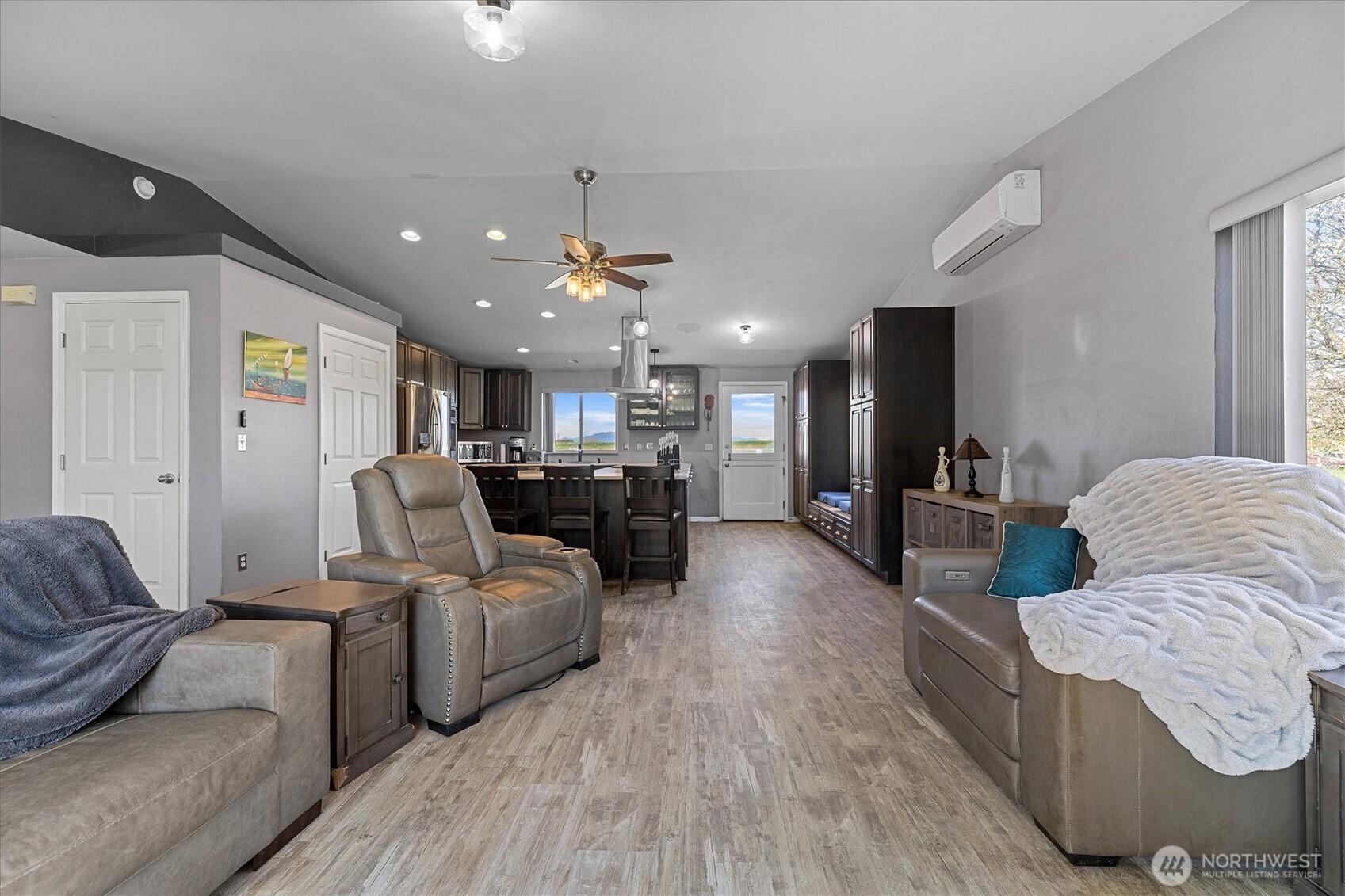 17771 Dunbar Road Mount Vernon, WA 98273 - Photo 13 of 38 a living room with furniture and a chandelier