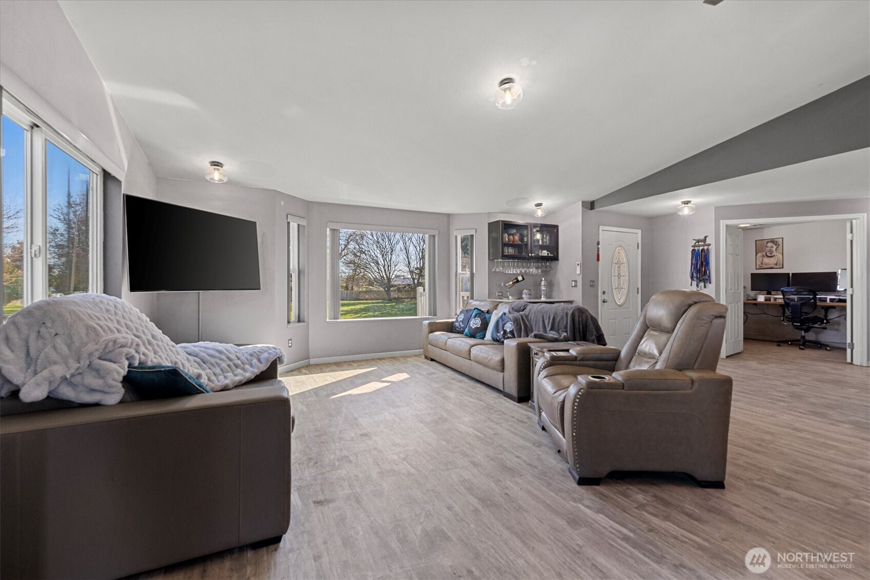 17771 Dunbar Road Mount Vernon, WA 98273 - Photo 14 of 38 a living room with furniture and a flat screen tv