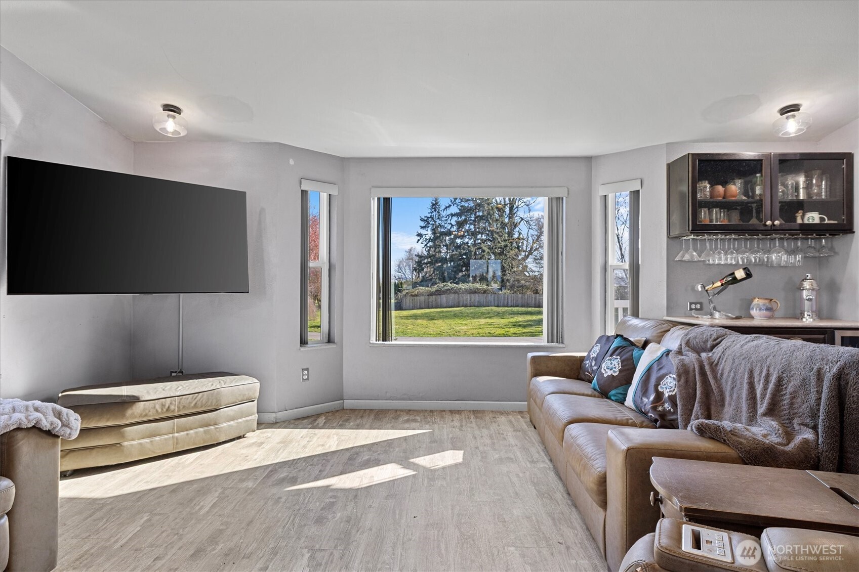 17771 Dunbar Road Mount Vernon, WA 98273 - Photo 15 of 38 a bedroom with furniture and a flat screen tv