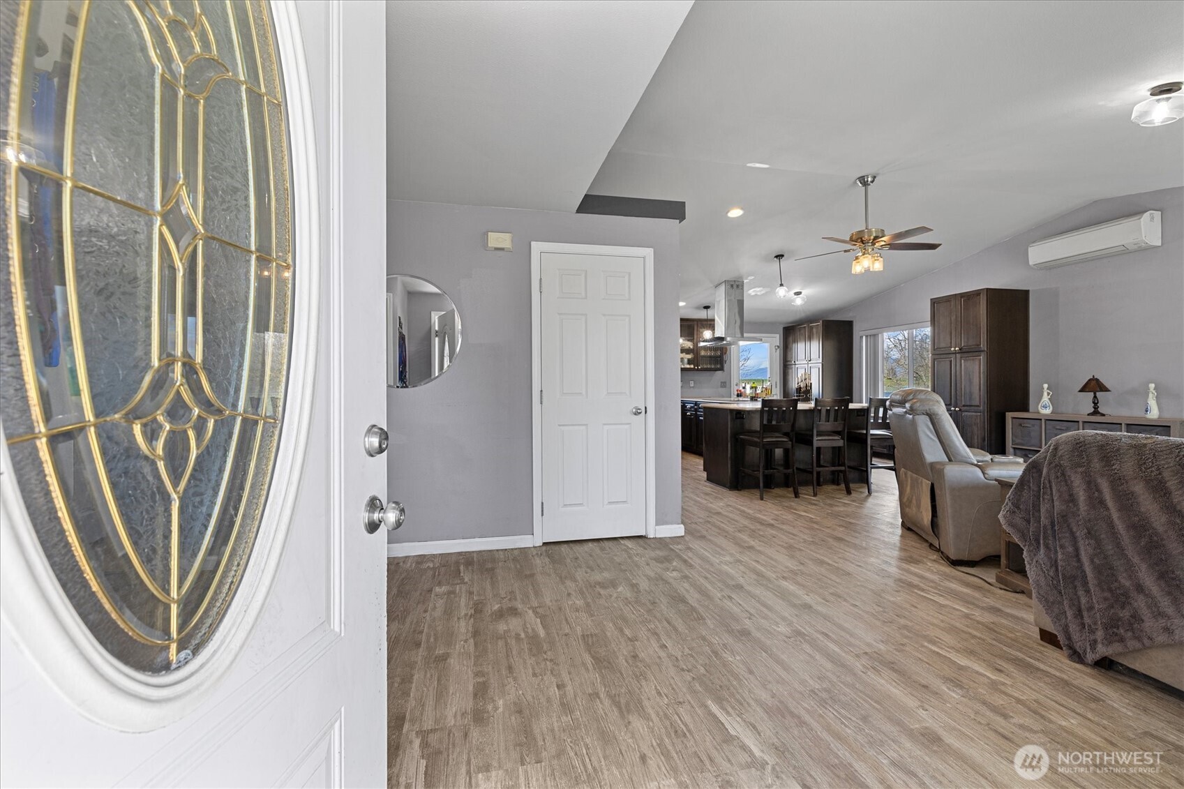 17771 Dunbar Road Mount Vernon, WA 98273 - Photo 2 of 38 a living room with furniture a refrigerator and a sink