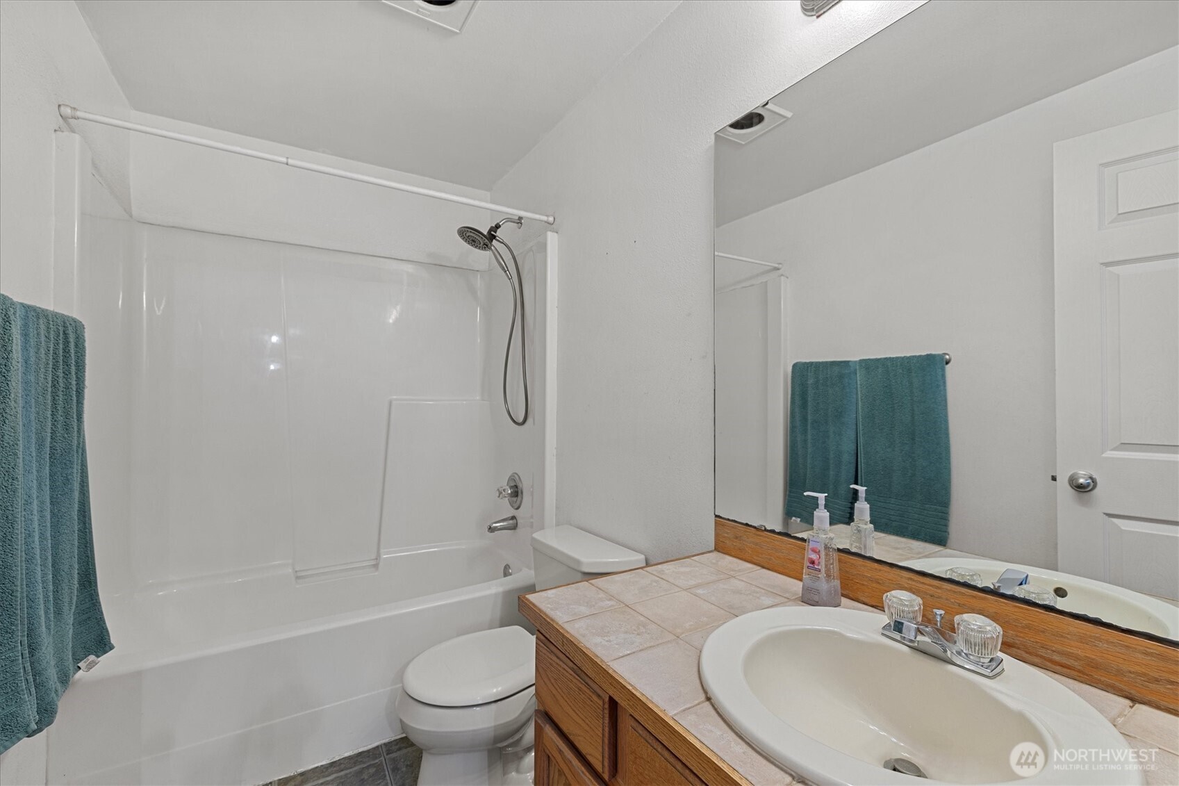 17771 Dunbar Road Mount Vernon, WA 98273 - Photo 23 of 38 a bathroom with a sink toilet and shower