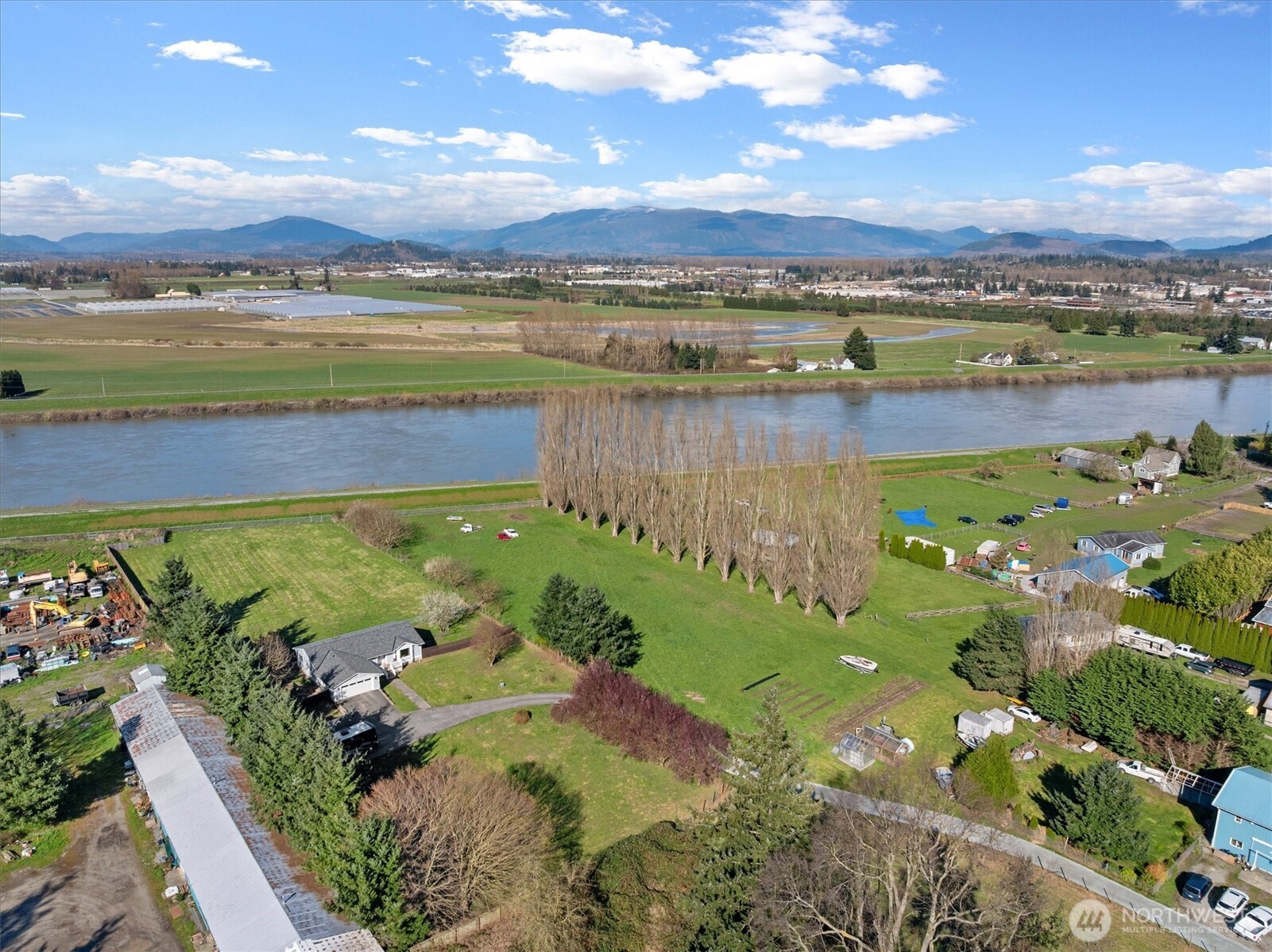 17771 Dunbar Road Mount Vernon, WA 98273 - Photo 30 of 38 a view of a lake with a city