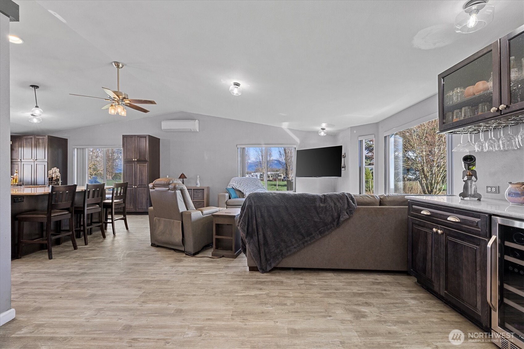 17771 Dunbar Road Mount Vernon, WA 98273 - Photo 4 of 38 a living room with furniture and a flat screen tv