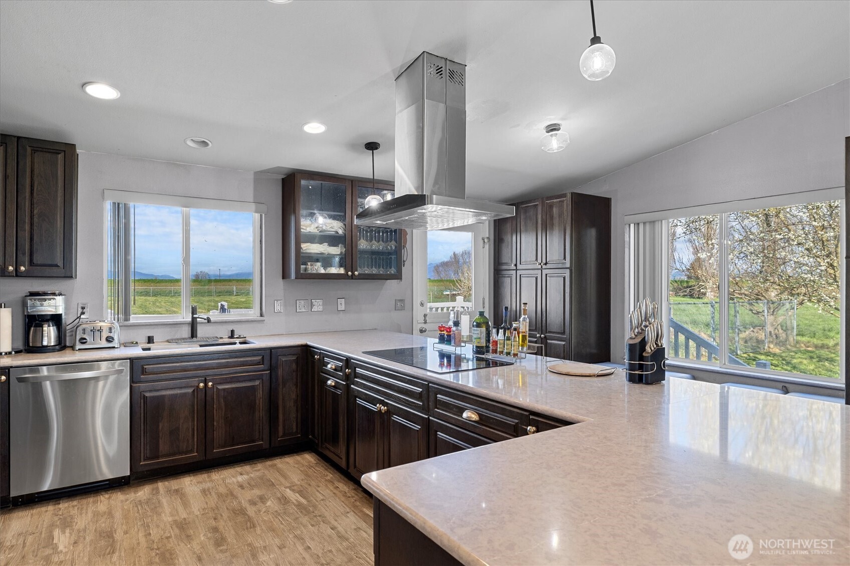 17771 Dunbar Road Mount Vernon, WA 98273 - Photo 10 of 38 a kitchen with lots of counter space a sink and a large window