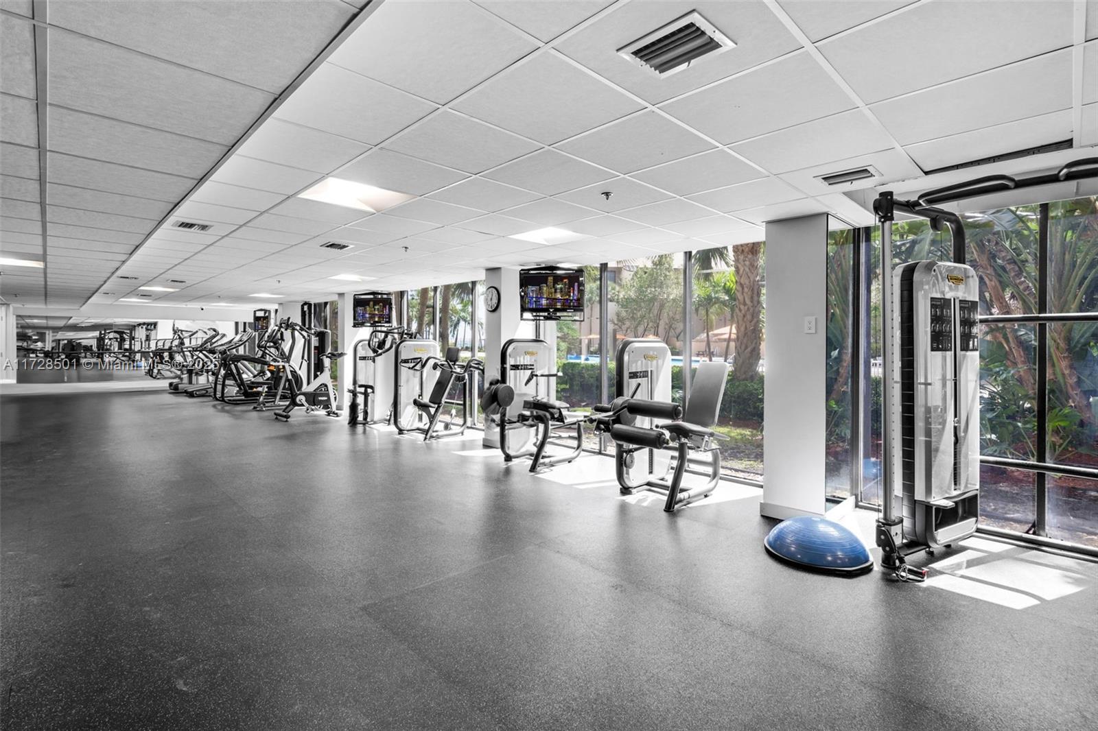 540 Brickell Key Drive, Unit 1021 Miami, FL 33131 - Photo 21 of 23 a view of a room with lots of gym equipment