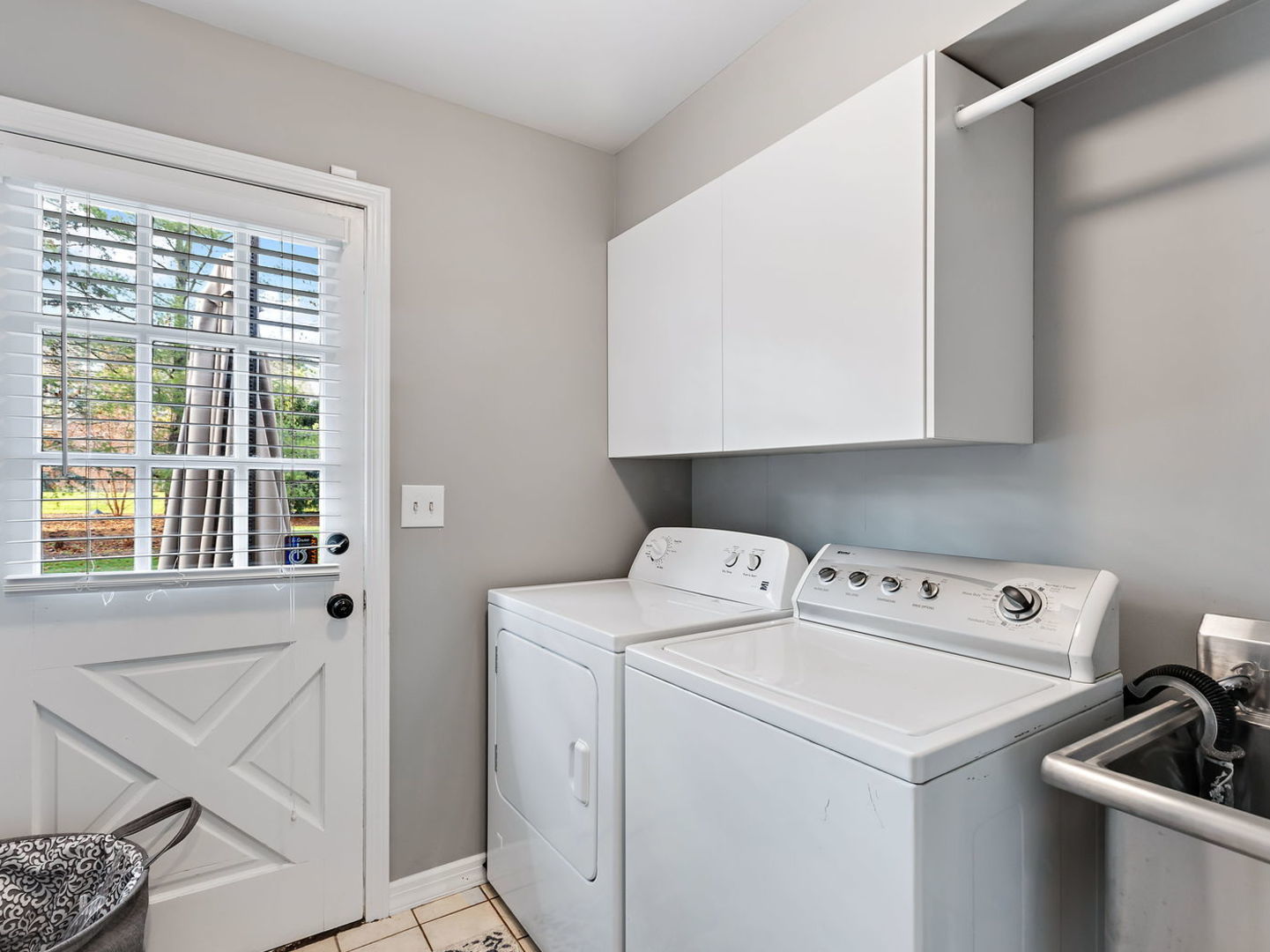 730 Valley Road Lake Forest, IL 60045 - Photo 12 of 33 a utility room with dryer and washer