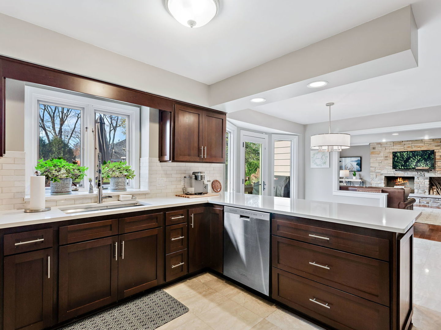 730 Valley Road Lake Forest, IL 60045 - Photo 9 of 33 a kitchen with a sink stove and microwave