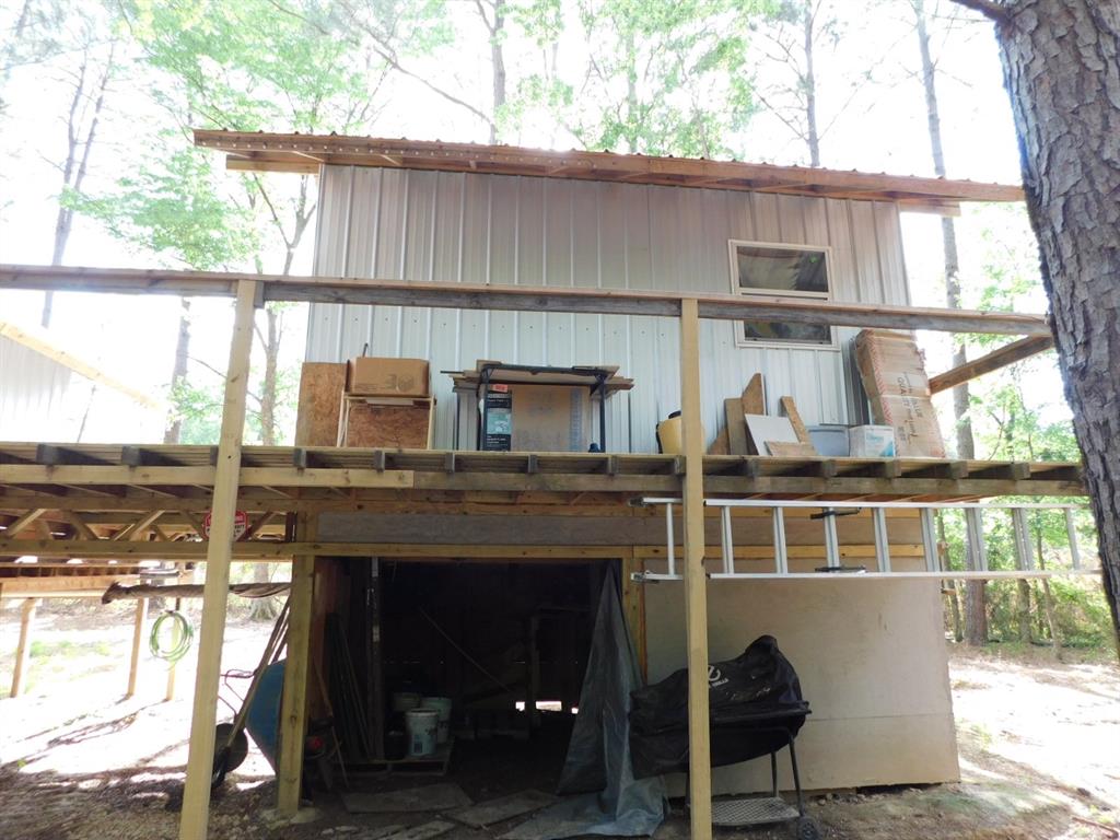 165 Rosewood Road Springhill, LA 71075 - Photo 5 of 27 a front view of a house with a yard