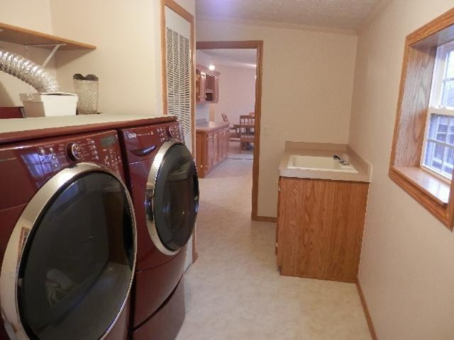 18402 Litzen Road Copemish, MI 49625 - Photo 20 of 34 Utility Room With Sink