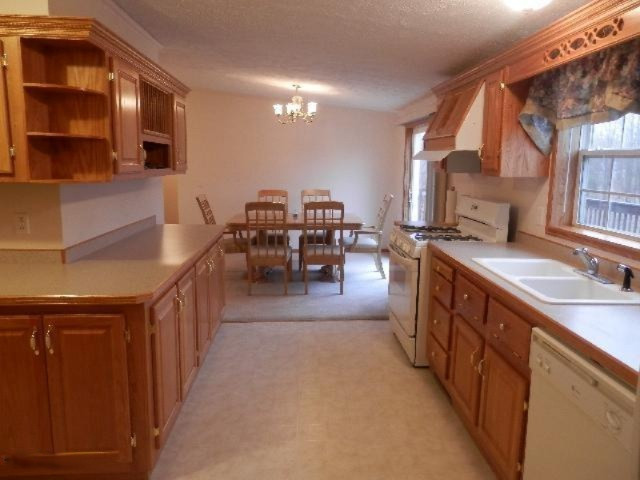 18402 Litzen Road Copemish, MI 49625 - Photo 3 of 34 Abundant Cabinets & Work Space