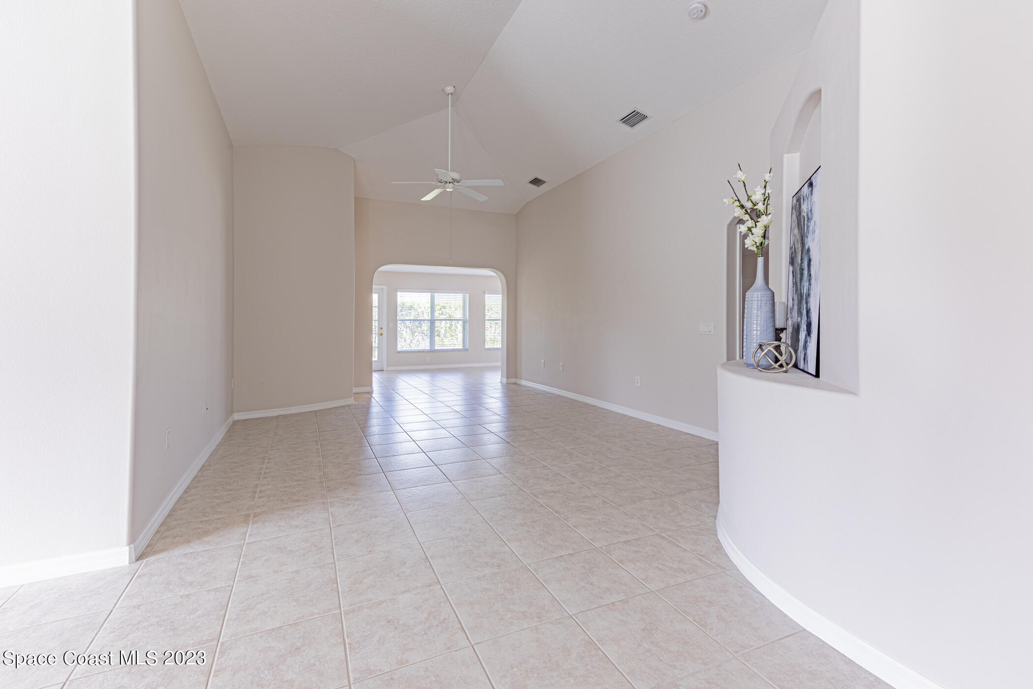 3102 Galindo Circle Melbourne, FL 32940 - Photo 14 of 31 an empty room with windows and closet