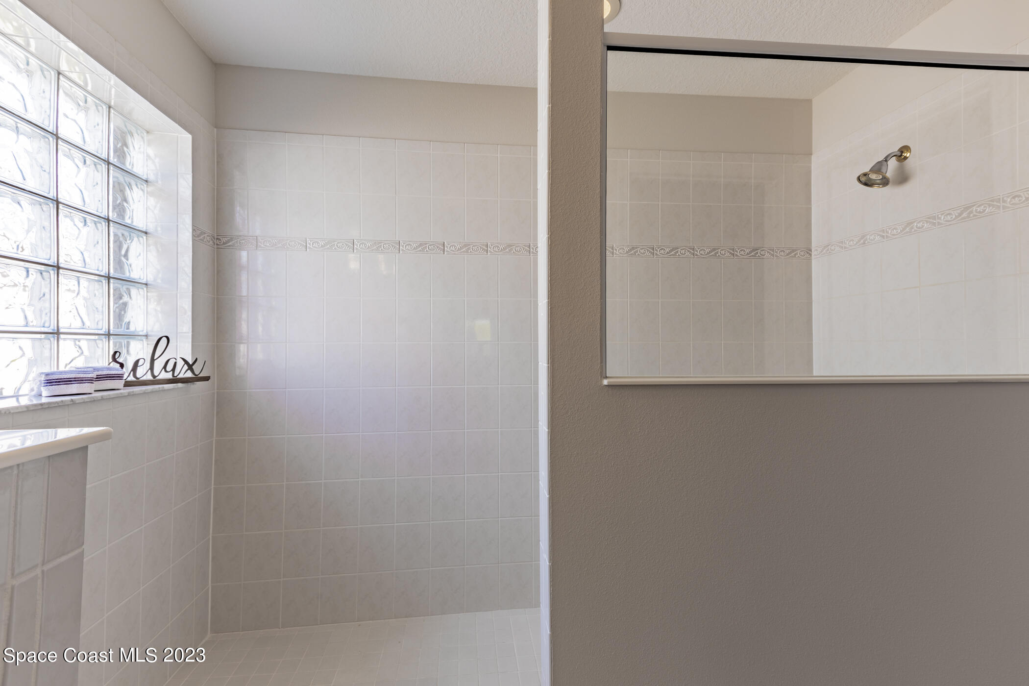 3102 Galindo Circle Melbourne, FL 32940 - Photo 21 of 31 a bathroom with a shower