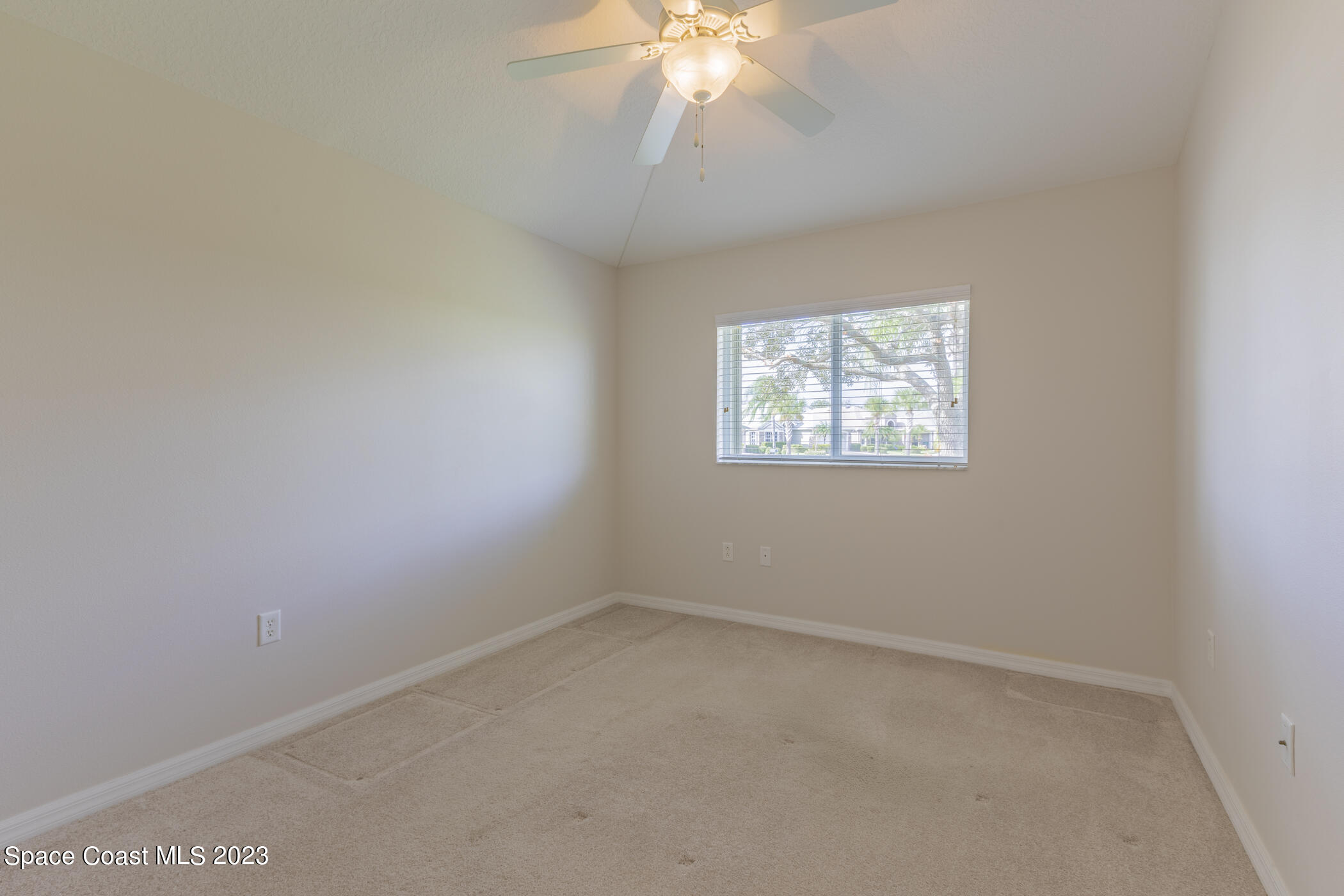 3102 Galindo Circle Melbourne, FL 32940 - Photo 27 of 31 an empty room with a window