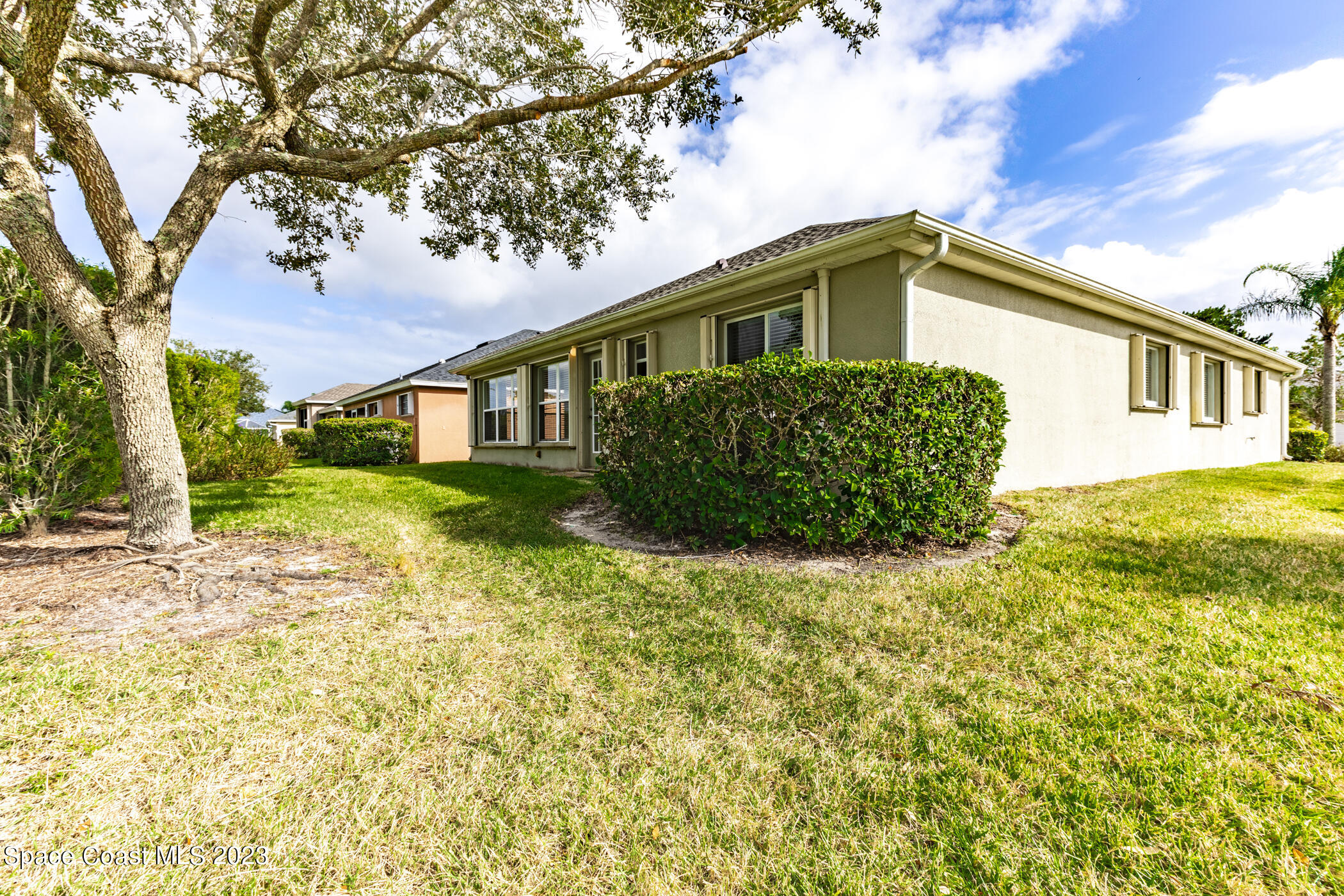 3102 Galindo Circle Melbourne, FL 32940 - Photo 31 of 31 a front view of a house with garden