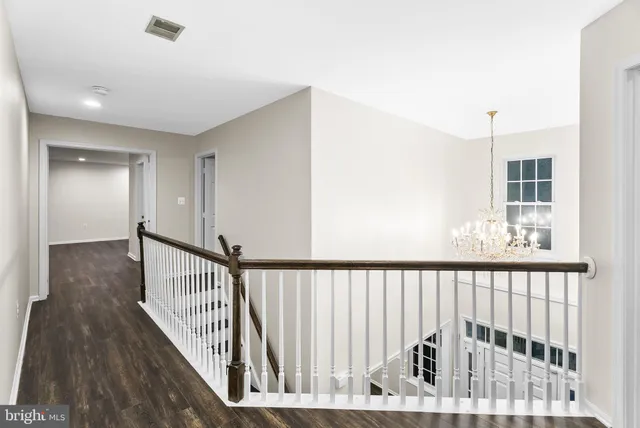 a view of a porch with wooden floor