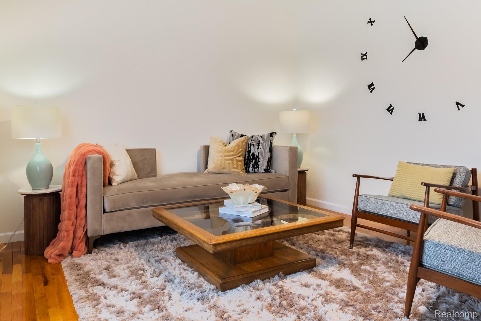 3882 Okemos Road Okemos, MI 48864 - Photo 11 of 50 Warm-toned wood-finish flooring complements the light wall color