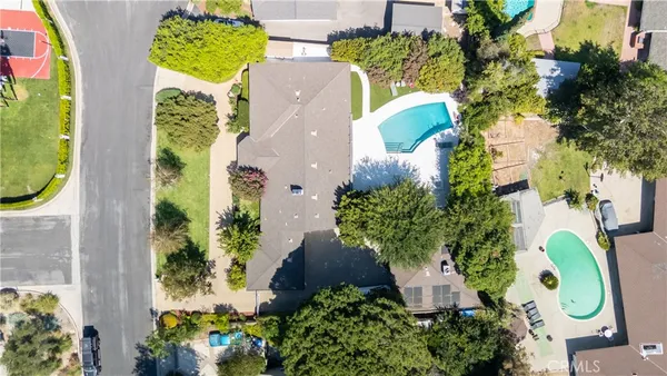 an aerial view of a swimming pool