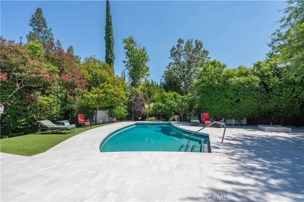a view of a backyard with a garden