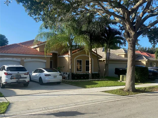 a view of a car park side of a road