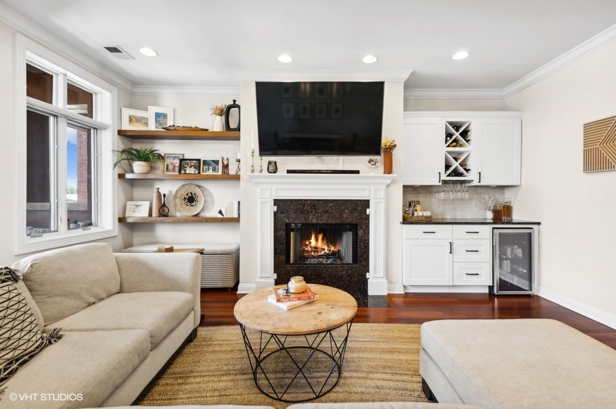 1411 West Chicago Avenue, Unit 3 Chicago, IL 60642 - Photo 3 of 17 a living room with furniture fireplace and flat screen tv