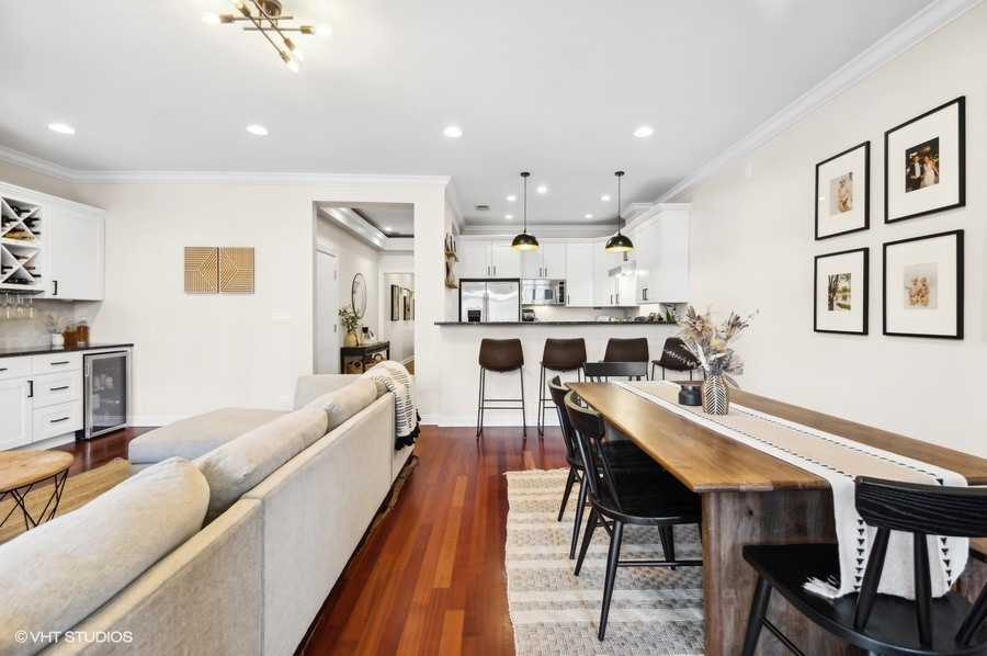 1411 West Chicago Avenue, Unit 3 Chicago, IL 60642 - Photo 6 of 17 a large kitchen with a table and chairs