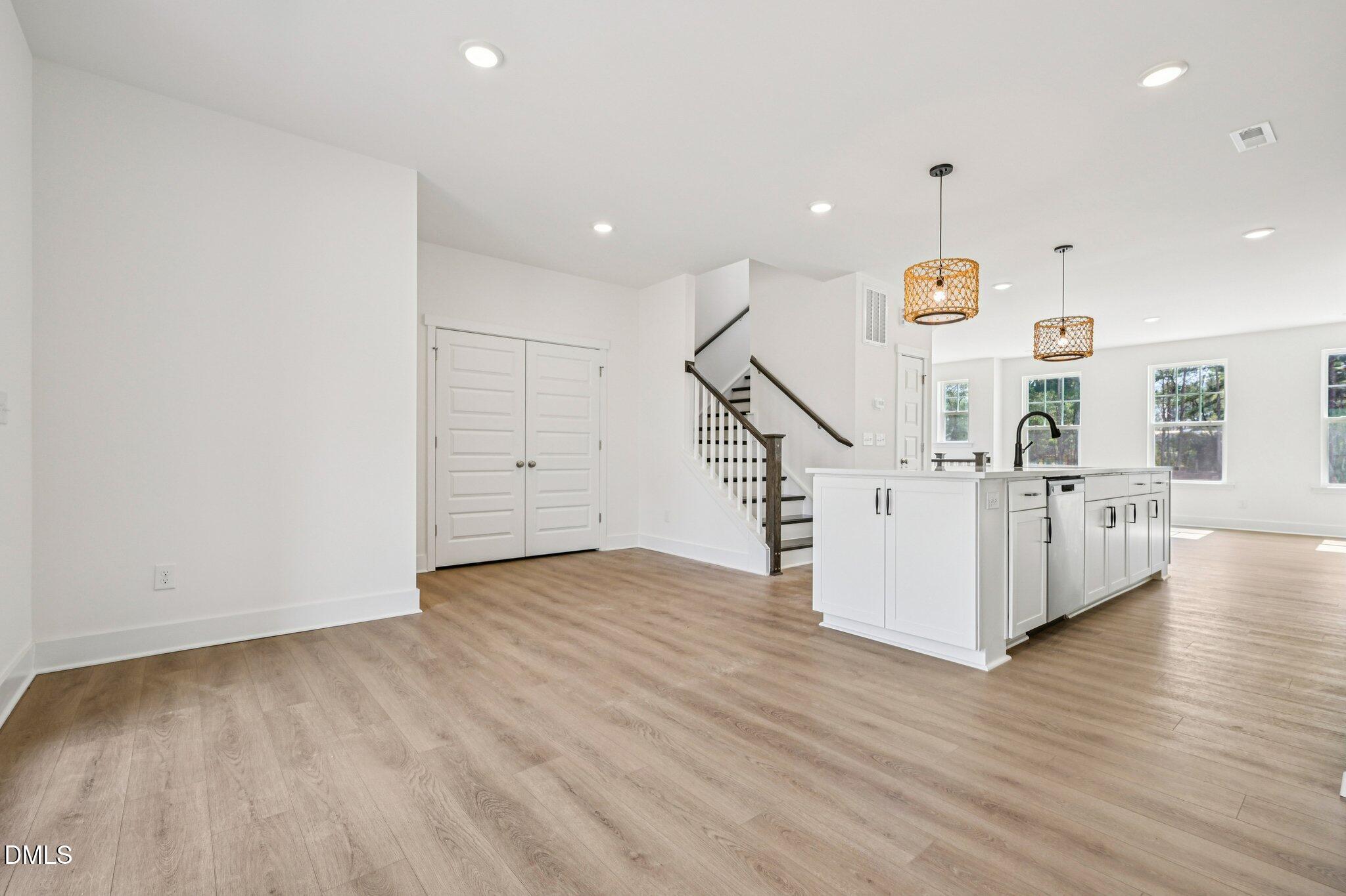 10905 Bayflower Way Raleigh, NC 27617 - Photo 8 of 49 a view of a livingroom with wooden floor