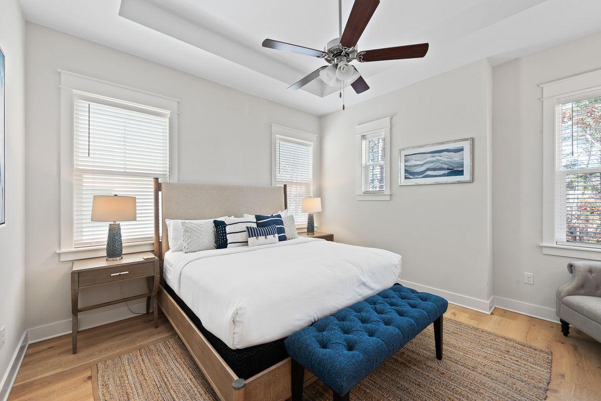 79 Pine Lands Loop Inlet Beach, Unit A Inlet Beach, FL 32461 - Photo 6 of 22 a room with a bed and windows