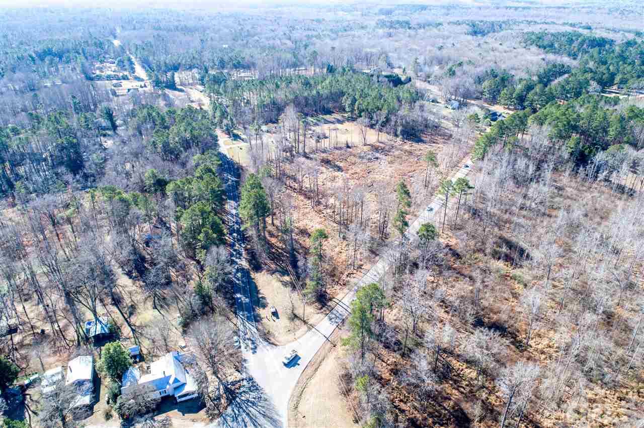 10120 Fanny Brown Road Raleigh, NC 27603 - Photo 14 of 22 a view of a city with lush green forest