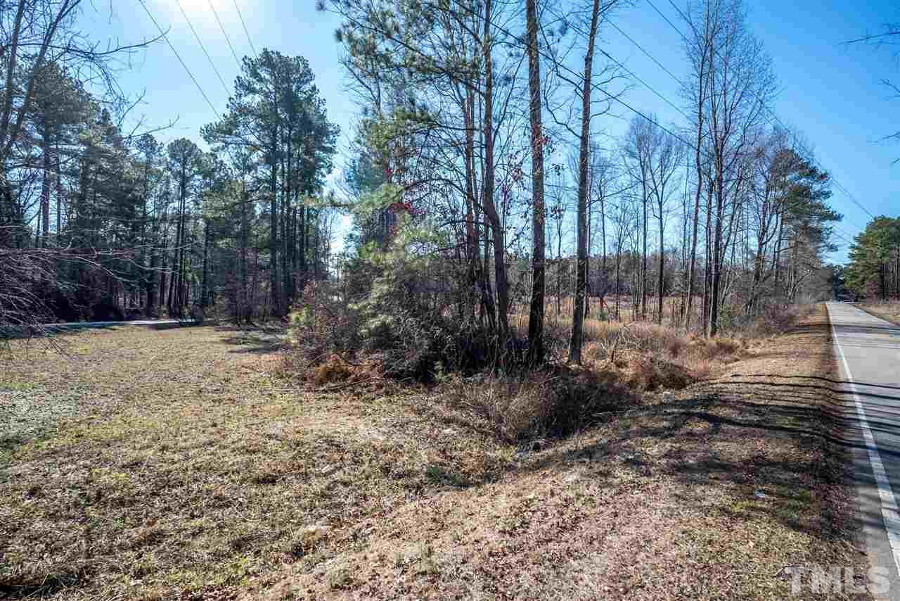 10120 Fanny Brown Road Raleigh, NC 27603 - Photo 5 of 22 a view of backyard with tree