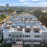 a view of a city with a lake