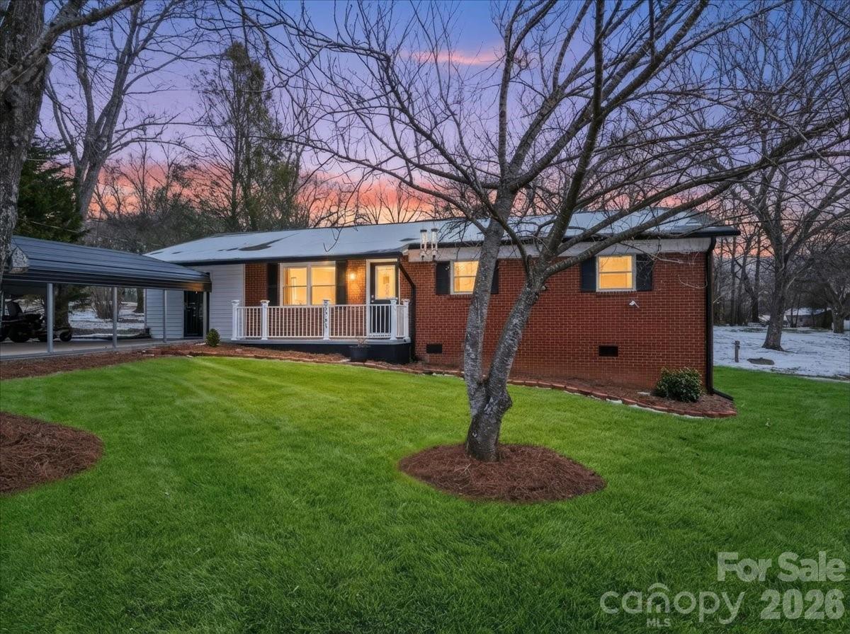 2563 Marble Street Newton, NC 28658 - Photo 1 of 40 a front view of house with yard and green space