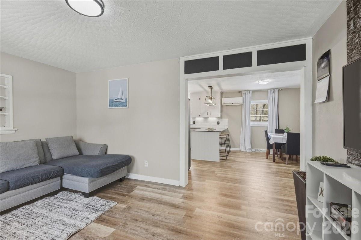 2563 Marble Street Newton, NC 28658 - Photo 11 of 40 a living room with furniture and a table