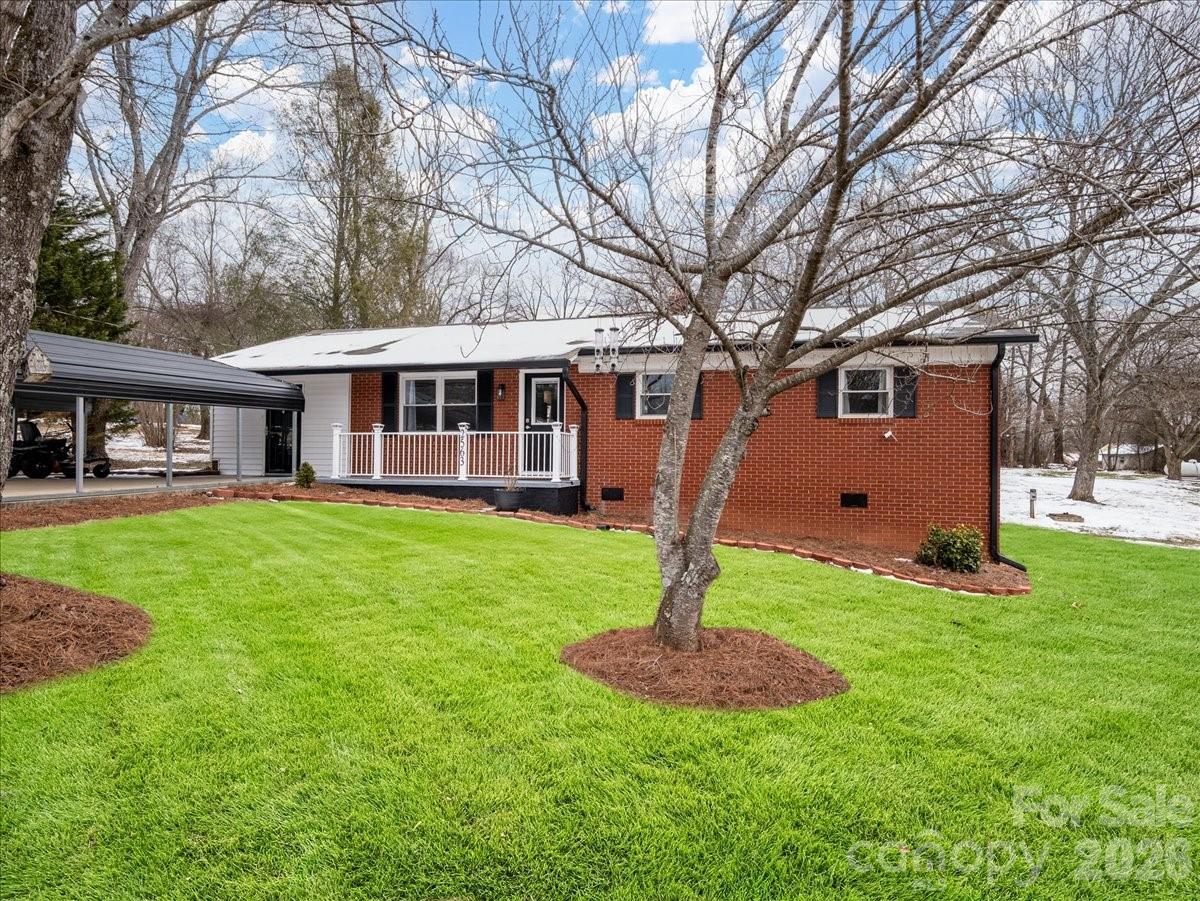 2563 Marble Street Newton, NC 28658 - Photo 2 of 40 a front view of house with yard and green space