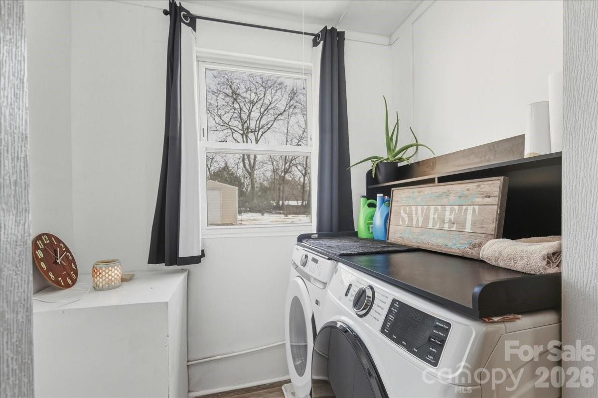 2563 Marble Street Newton, NC 28658 - Photo 30 of 40 a utility room with dryer and washer