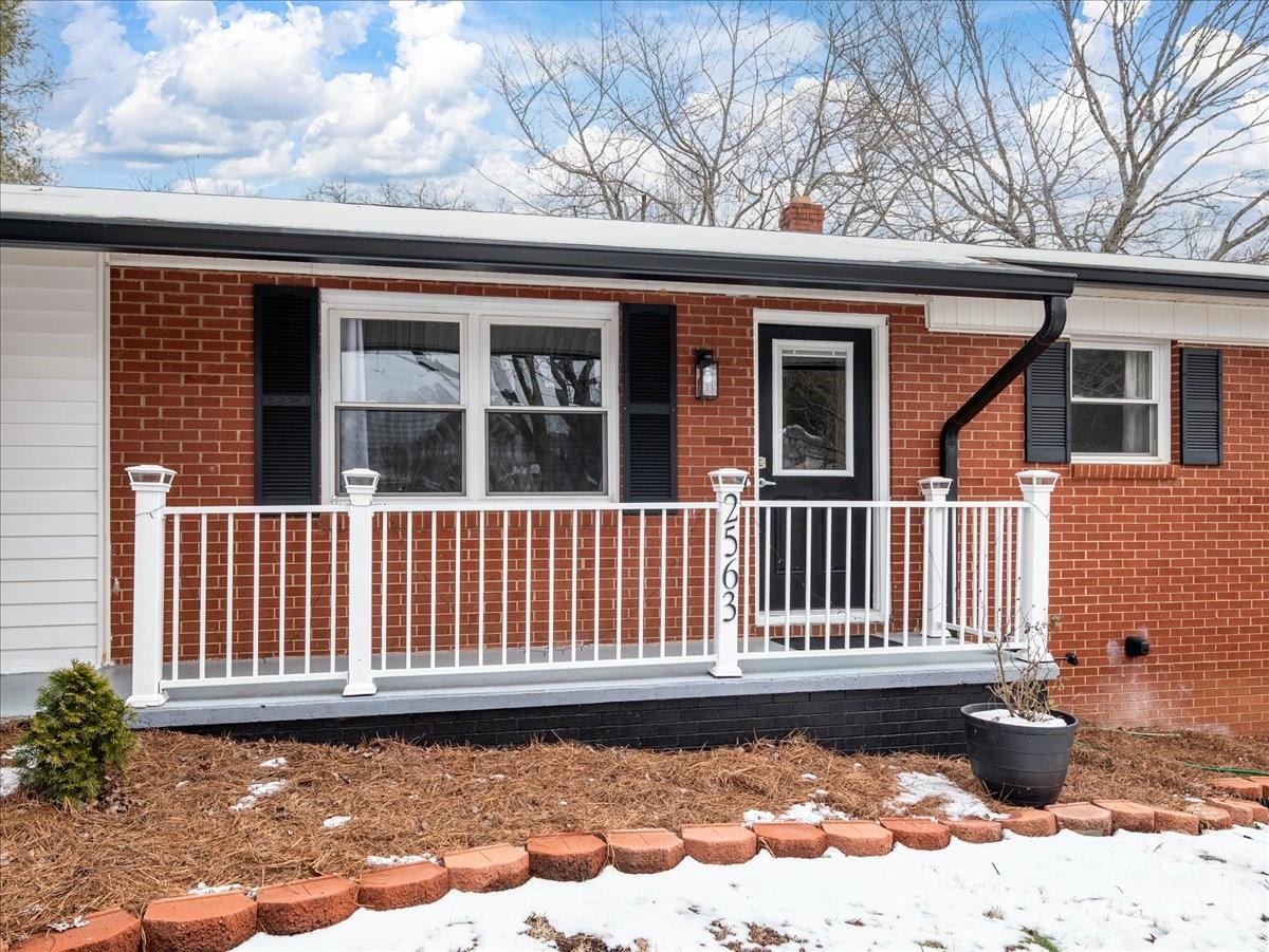 2563 Marble Street Newton, NC 28658 - Photo 7 of 40 a front view of a house with a yard