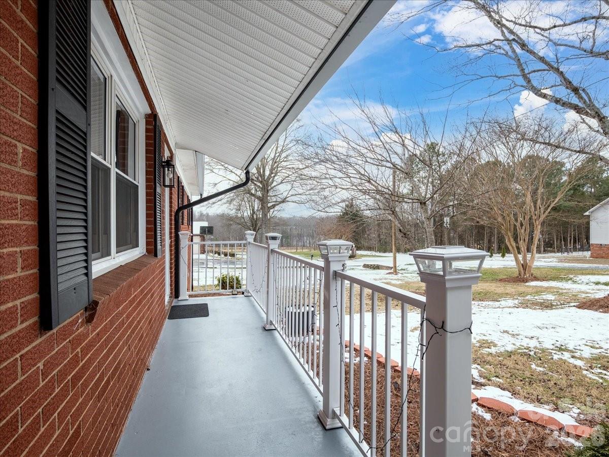 2563 Marble Street Newton, NC 28658 - Photo 9 of 40 a view of a house with a yard