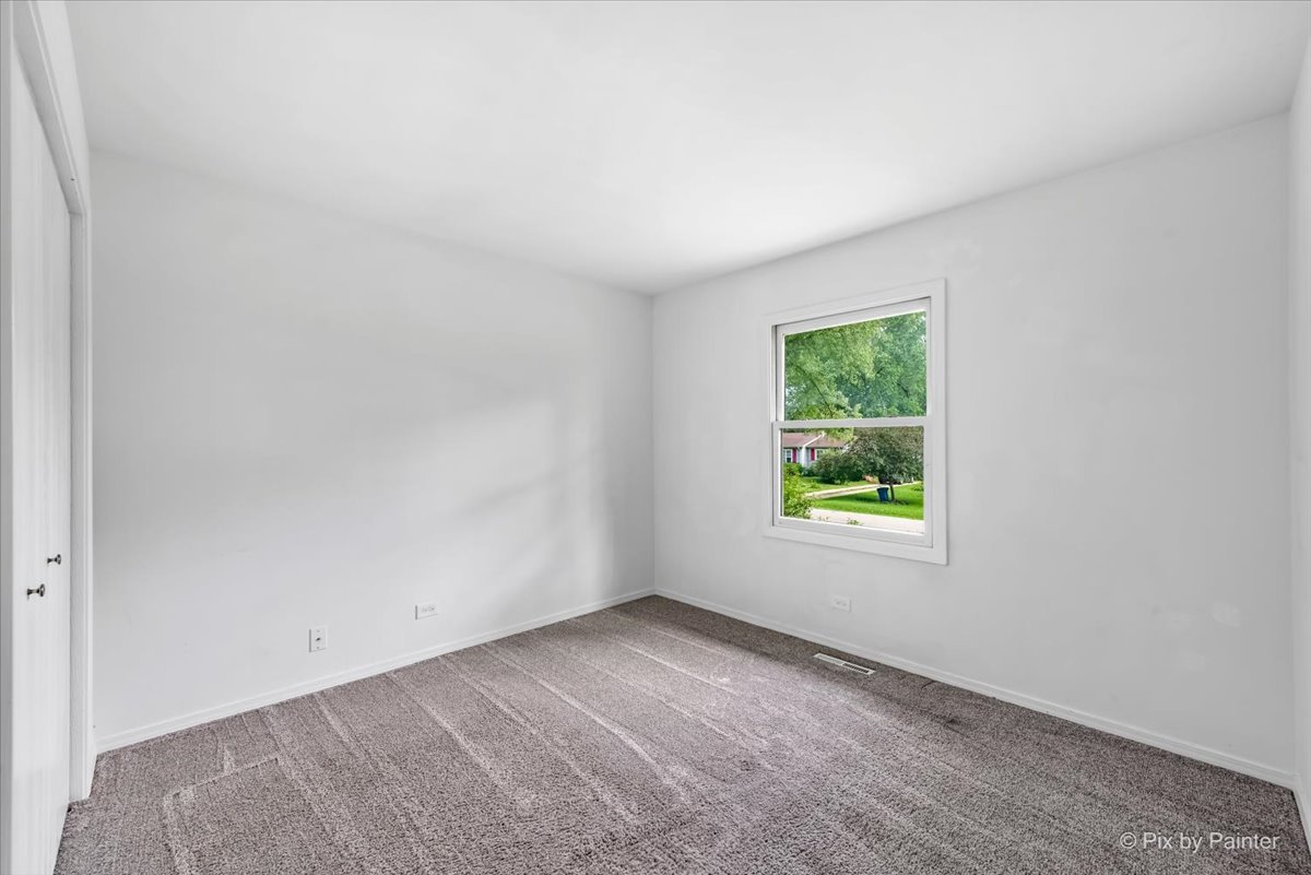 3 Deerpath Road Lake In The Hills, IL 60156 - Photo 17 of 27 an empty room with a window