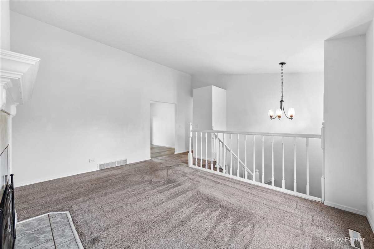 3 Deerpath Road Lake In The Hills, IL 60156 - Photo 4 of 27 a view of a room with stairs