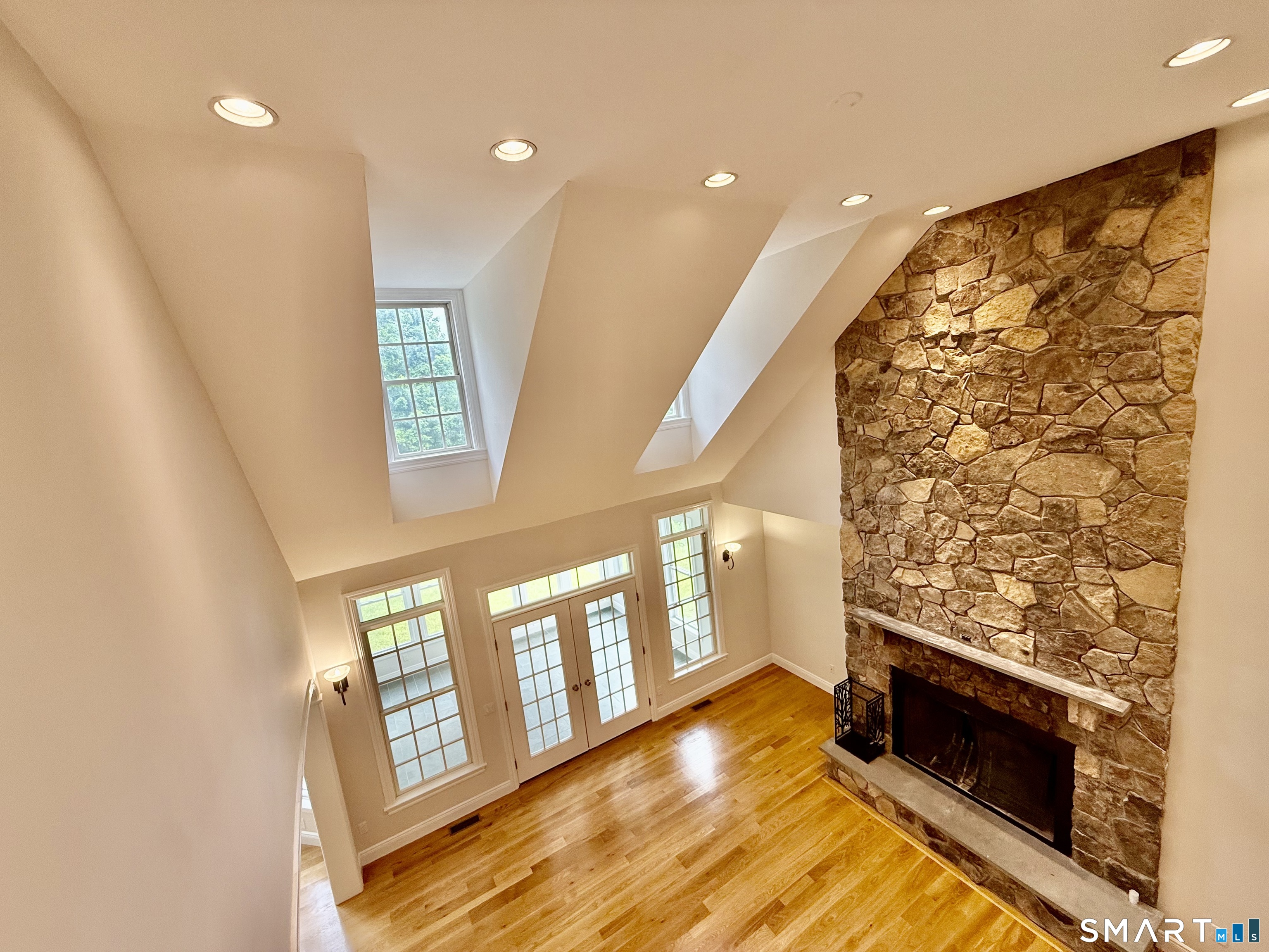 84 Smith Road Lebanon, CT 06249 - Photo 9 of 34 Great room with oversized custom windows & doors for an abundance of natural lighting!