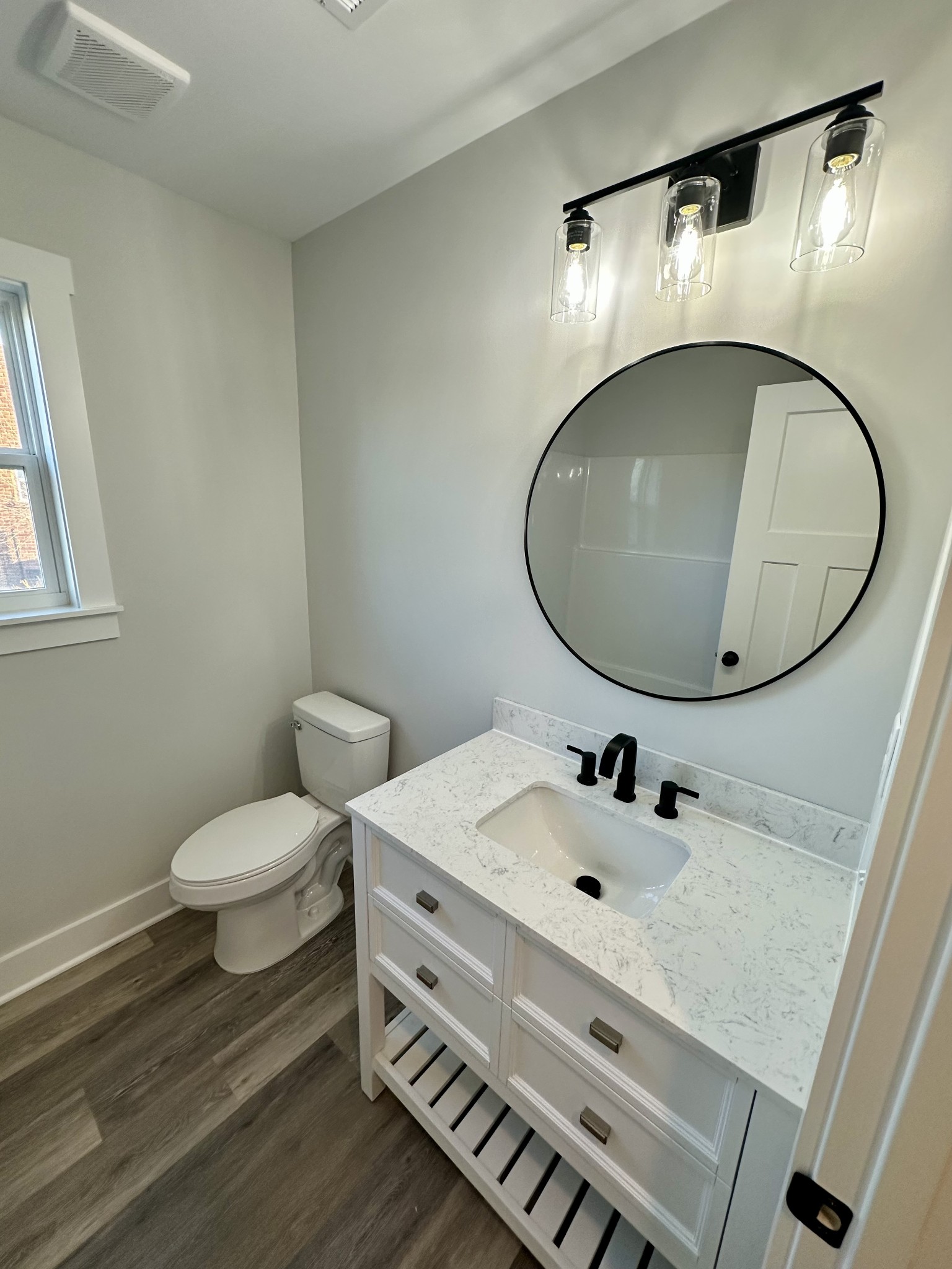 208 Derek Court Portland, TN 37148 - Photo 20 of 27 a bathroom with a sink and a mirror