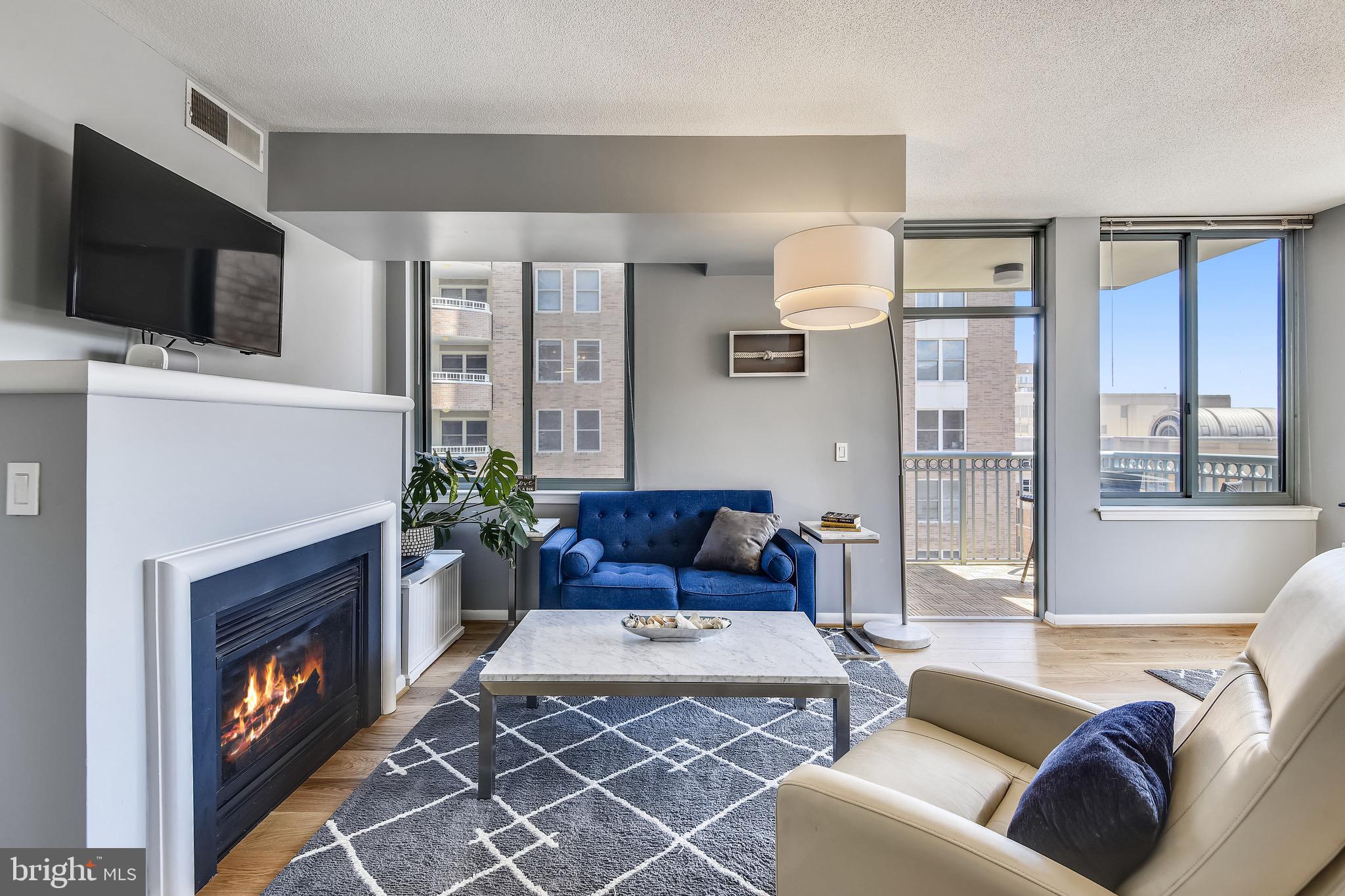 851 North Glebe Road, Unit 1505 Arlington, VA 22203 - Photo 3 of 85 Living Room w/ Gas Fireplace and Hardwood Flooring