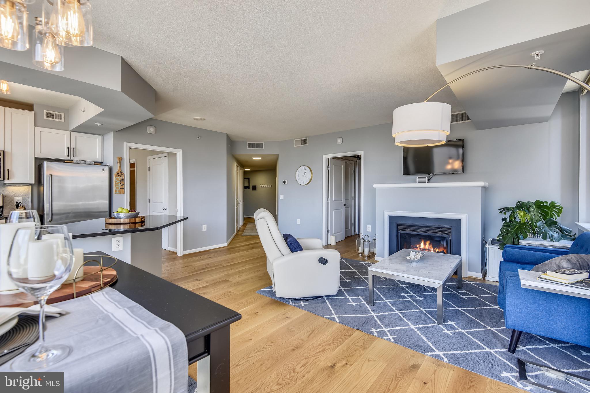 851 North Glebe Road, Unit 1505 Arlington, VA 22203 - Photo 4 of 85 Living Room w/ Gas Fireplace and Hardwood Flooring