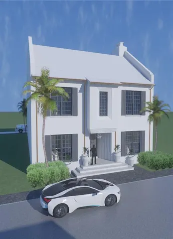 a front view of a house with a yard and outdoor seating