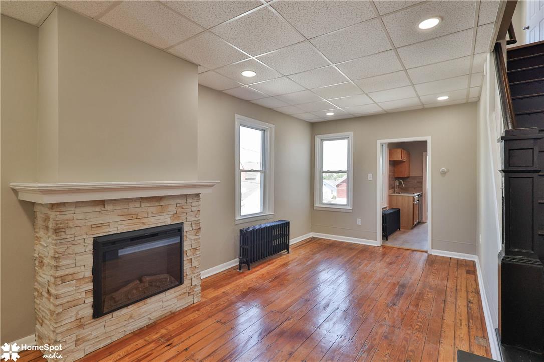 619 Sioux Street Bethlehem, PA 18015 - Photo 10 of 61 a view of an empty room with window and fire place