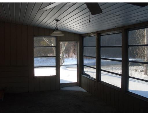 376 Norridgewock Road Fairfield, ME 04937 - Photo 11 of 15 Patio/Deck. enclosed porch