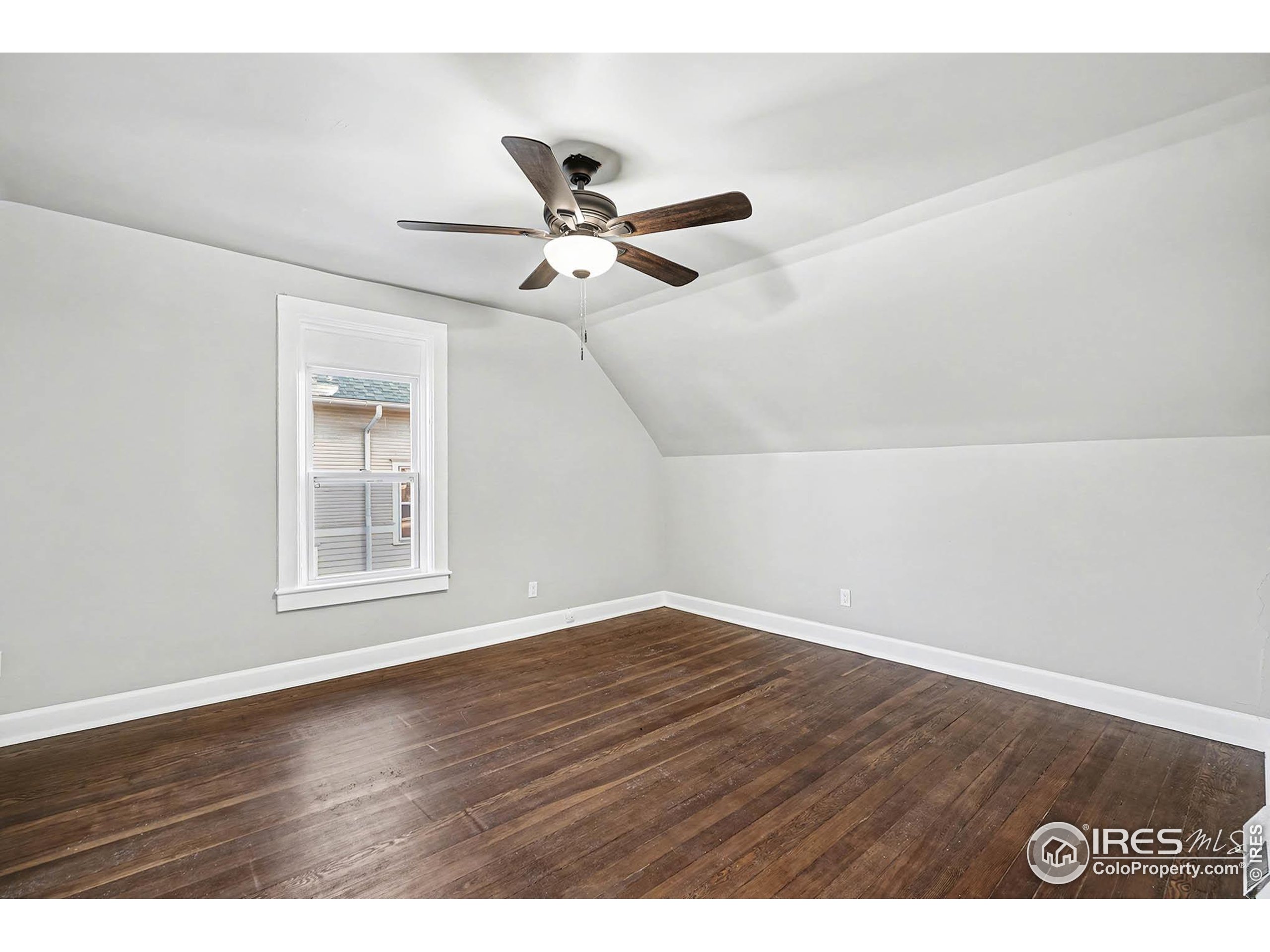 1330 8th Street Greeley, CO 80631 - Photo 21 of 27 a view of an empty room with a window
