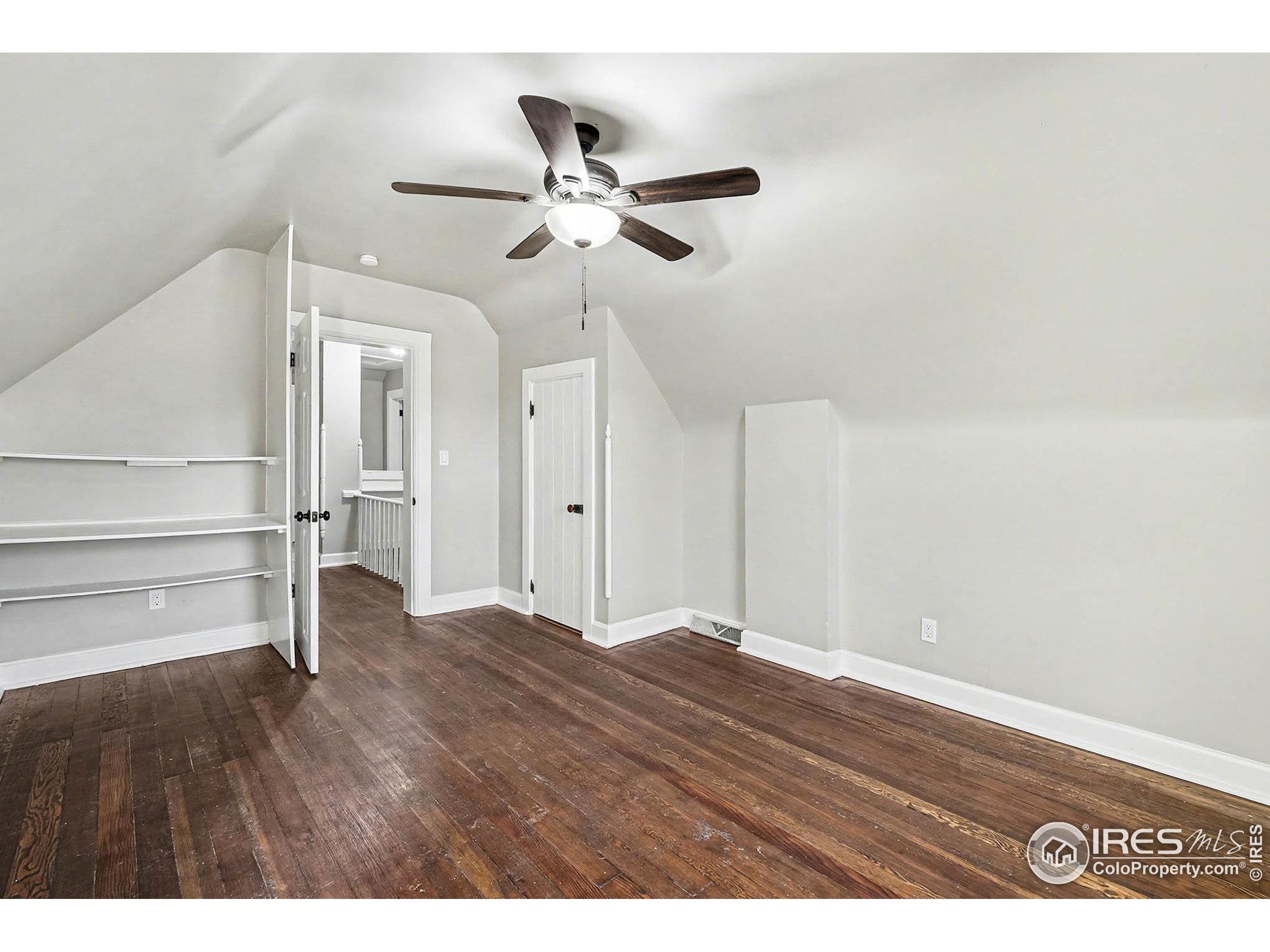 1330 8th Street Greeley, CO 80631 - Photo 25 of 27 a view of empty room with wooden floor