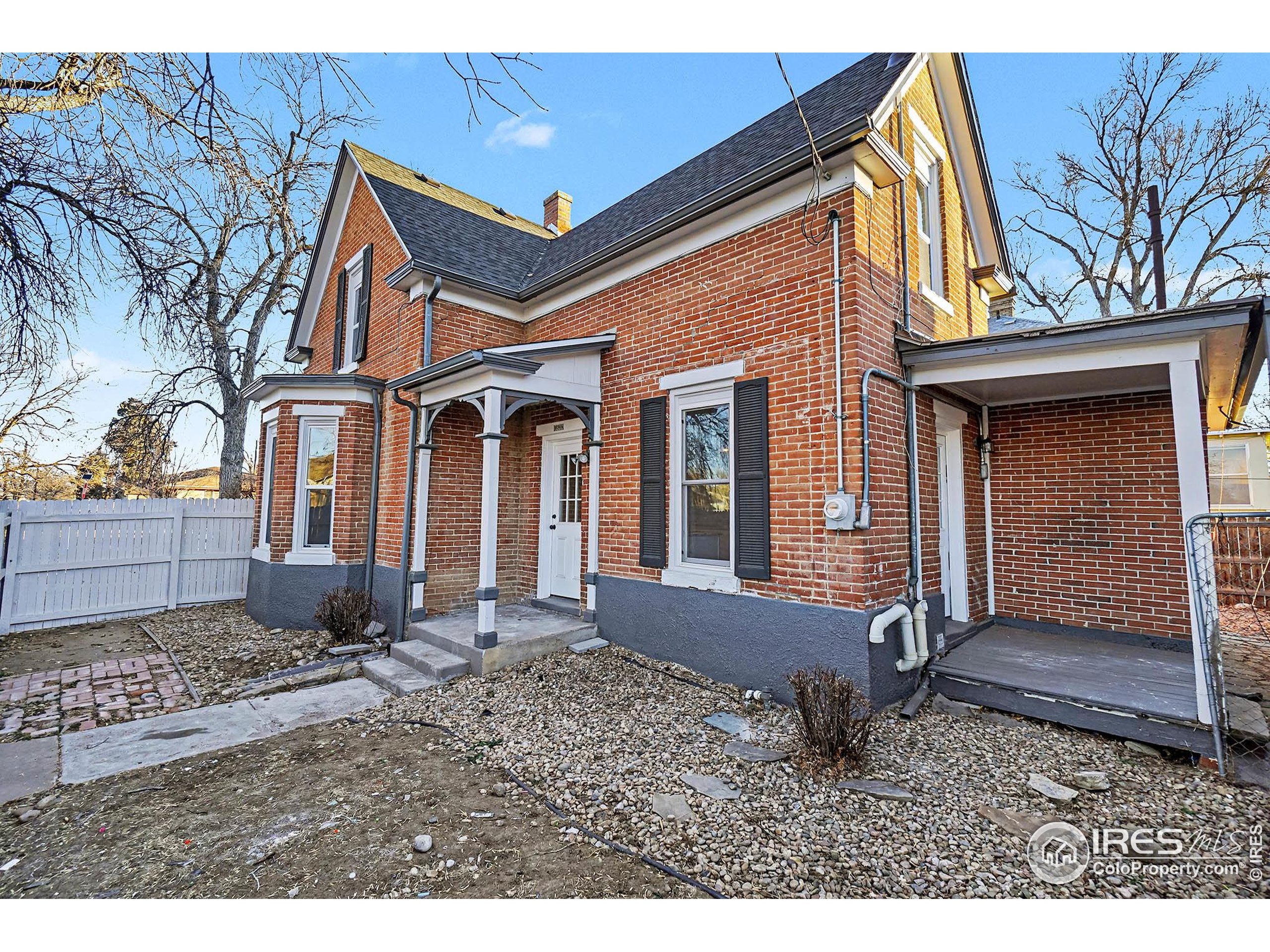 1330 8th Street Greeley, CO 80631 - Photo 26 of 27 a front view of a house with garden