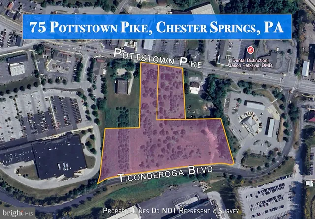 a view of a golf course with a road