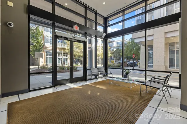a room with natural light and furniture